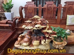 Tượng di lặc ngồi gốc tùng gỗ hương, Cao 36cm rộng sâu 30cm rộng 68cm 