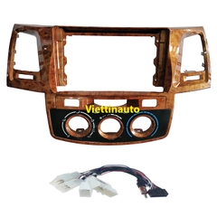 Mặt dưỡng khung lắp màn hình xe  Toyota Fortuner  Toyota Hilux  2010-2015- Vân gỗ Kèm rắc nguồn