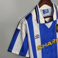 ÁO RETRO MU XANH 1995