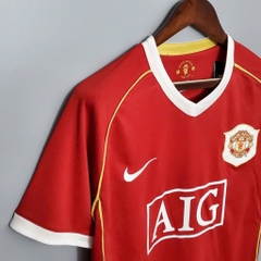 ÁO RETRO MU ĐỎ 2006