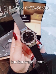 Đồng Hồ Nữ Hublot HLNSV012 - Dây Đen Mặt Đen Vỏ Bạc - 34mm