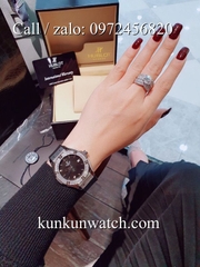 Đồng Hồ Nữ Hublot HLNSV012 - Dây Đen Mặt Đen Vỏ Bạc - 34mm