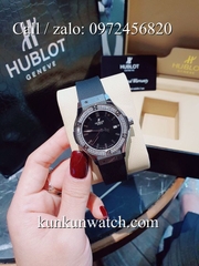 Đồng Hồ Nữ Hublot HLNSV012 - Dây Đen Mặt Đen Vỏ Bạc - 34mm