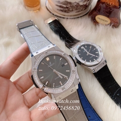 Đồng Hồ Nam Hublot Automatic Viền Đá Vuông Dây Da Vân Silicone Xám Silver 42mm