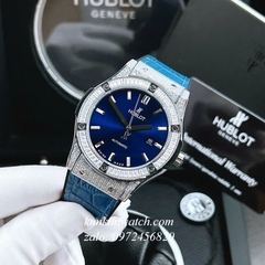 Đồng Hồ Nam Hublot Automatic Viền Đá Vuông Full Vỏ Dây Da Vân Silicone Xanh Silver 42mm