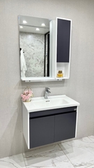 TC2325 - Tủ chậu nhựa PVC, mặt chậu sứ âm liền khối. kích thước 47x70cm