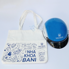Bộ quà tặng mũ bảo hiểm, túi canvas, gối cổ  - In logo Nha khoa Bani