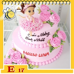 Bánh kem búp bê E17 váy hồng ngồi trên bánh 2 tầng nhiều bông hoa màu hồng xinh xắn