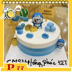 Bánh kem P77 màu trắng và xanh dương với mô hình Doraemon ở chính giữa