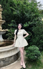 Đầm chấm bi xòe nơ cổ tròn