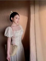 Đầm hoa nhí nơ ngực tay bồng