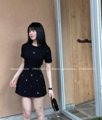 Chân váy chữ A đính Chanel