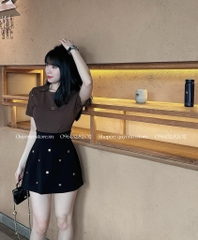 Chân váy chữ A đính Chanel