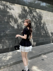 Đầm đen phối tơ cột nơ