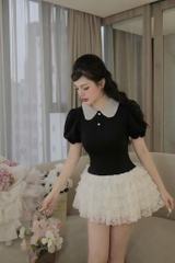 Đầm ren đen trắng cổ sen đá