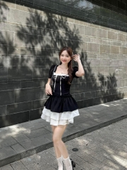 Đầm đen phối tơ cột nơ