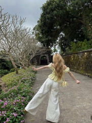 Set áo nhún tay phồng quần suông trắng