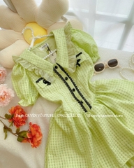Đầm xanh chất gân ô
