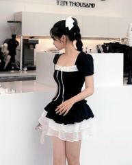 Đầm đen phối tơ cột nơ