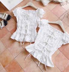 Áo trắng nhún chỉ thắt nơ