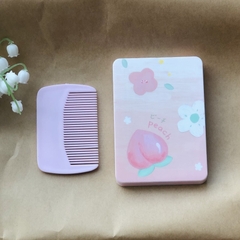 Gương cầm tay kèm lược