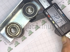 Bánh xe cửa lùa sắt 4 bánh phi 32 U5