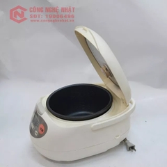 Nồi cơm điện mâm nhiệt hiệu Zojirushi NS-SH10 2006 dung tích 1.0L màu trắng sữa nội địa Nhật