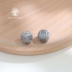Charm tròn góc cạnh họa tiết đồng tiền