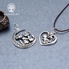 Charm bạc trái tim chứa chuột treo