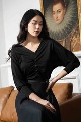 34044Y620 - Chân váy dáng A màu đen giả bò, tà bong đính cúc trang trí.
