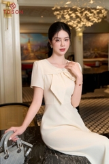 46086W66 - Đầm be kem xòe cổ đính nơ- carolan