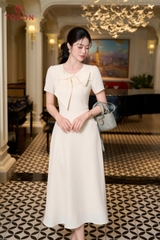 46086W66 - Đầm be kem xòe cổ đính nơ- carolan