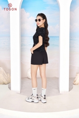 AP145B94 - Áo sequin đen in chữ, gấu chéo xếp nhún