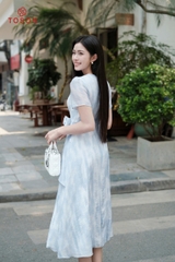 43043H95 - Đầm xòe nơ eo, tơ loang xanh nhạt