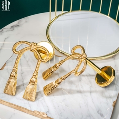 BOWS BRASS CURTAIN TIE