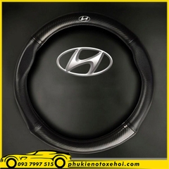 Bọc vô lăng cacbon logo xe