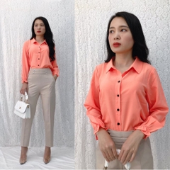 Áo sơ mi hồng cam tay dài phối bèo