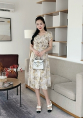 Đầm xòe hoa nhí xếp ngực đính nút, tay búp sen, có túi - GR0310