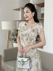 Đầm xòe hoa nhí xếp ngực đính nút, tay búp sen, có túi - GR0310