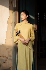 Áo dài 2 tà vàng quần xanh 25908