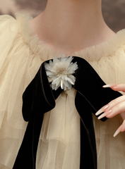 Floral embellished velvet bow brooch