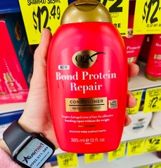 Dầu xả phục hồi tóc hư tổn OGX Bond Protein Conditioner