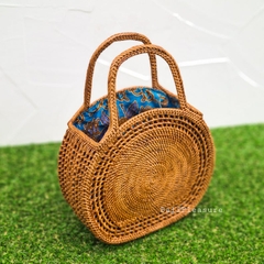 Vintage handmade light brown woven natural straw bohemian satchel bag with dark blue flowers, natural common water hyacinth satchel bag