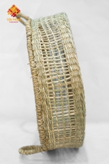Seagrass storage basket with hand