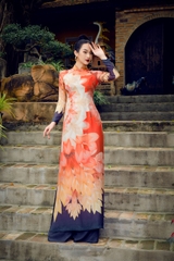 Traditional Vietnamese dress with orange lotus pattern