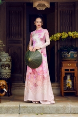 Traditional Vietnamese dress with pink lotus pattern