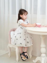 Váy 3T nơ chấm bi đen xinh xắn