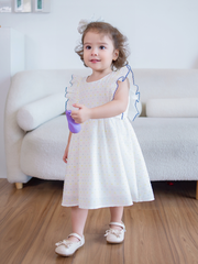 Váy trắng sát nách cánh tiên thô hạt sắc màu