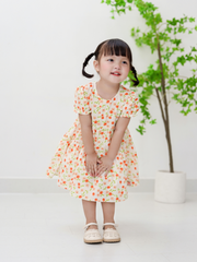 Váy tay dài nơ vàng nhún chun điệu đà