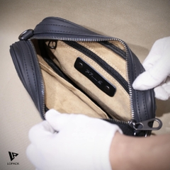 Clutch kiêm túi đeo chéo da đan